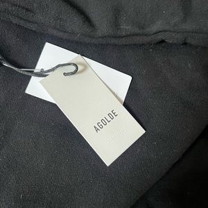 AGolde turtle neck balloon sleeve sweatshirt.